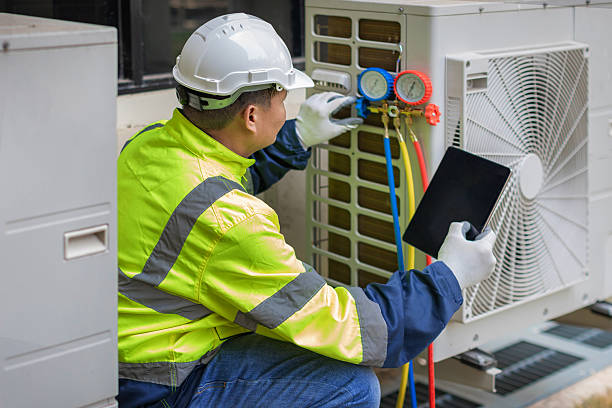 Professional Hvac Installation technician working in Yukon, MO